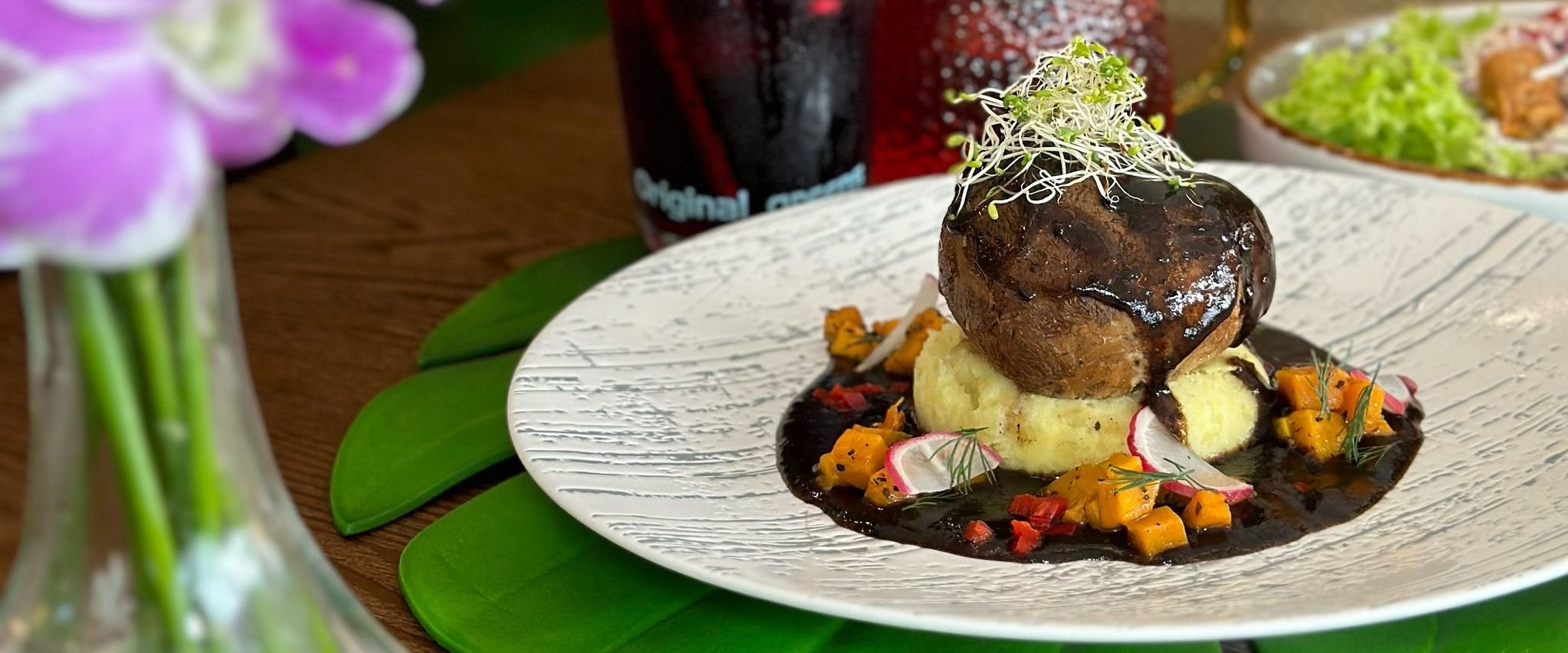 Stuffed portobello mushroom plated at Original Greens